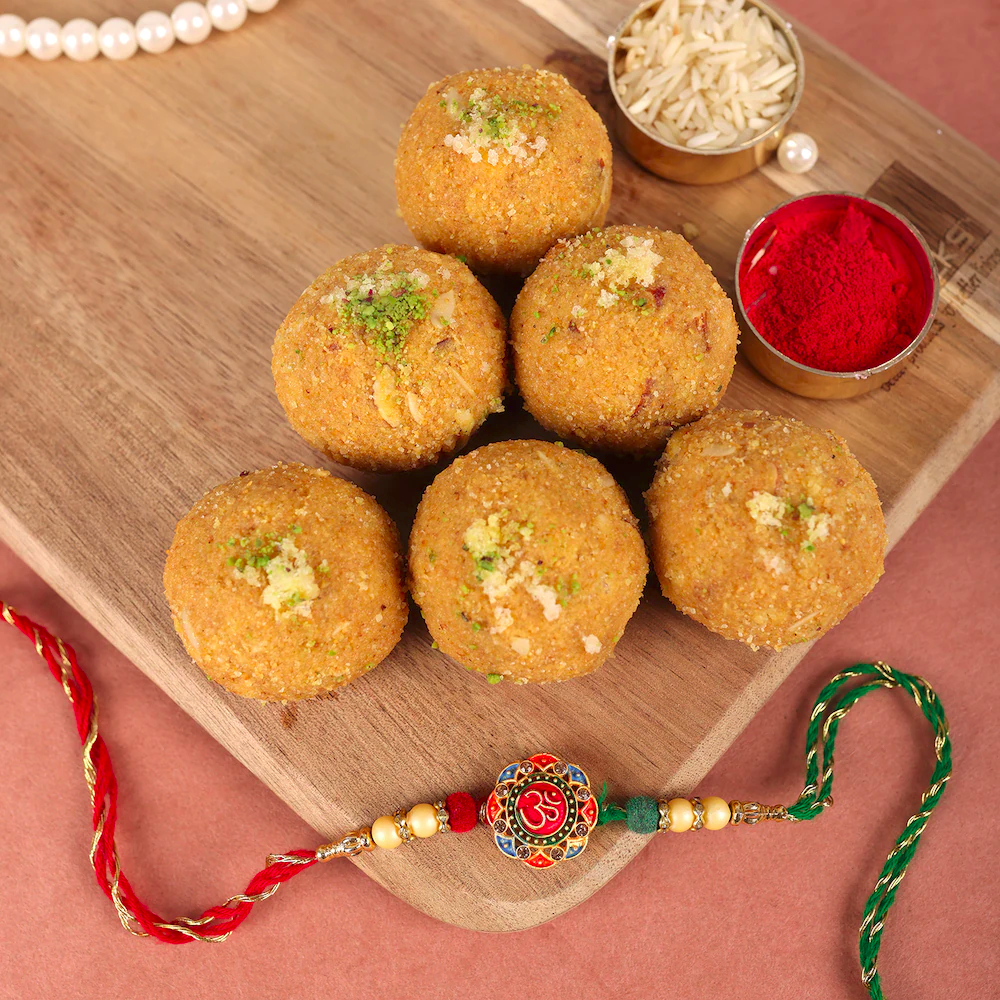  Om Rakhi With Yummy Besan Ladoo Combo
